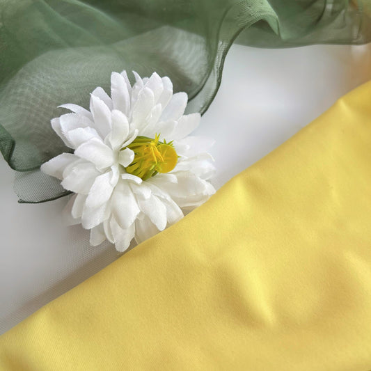 Close up of our waterproof lemon summer clothing fabric