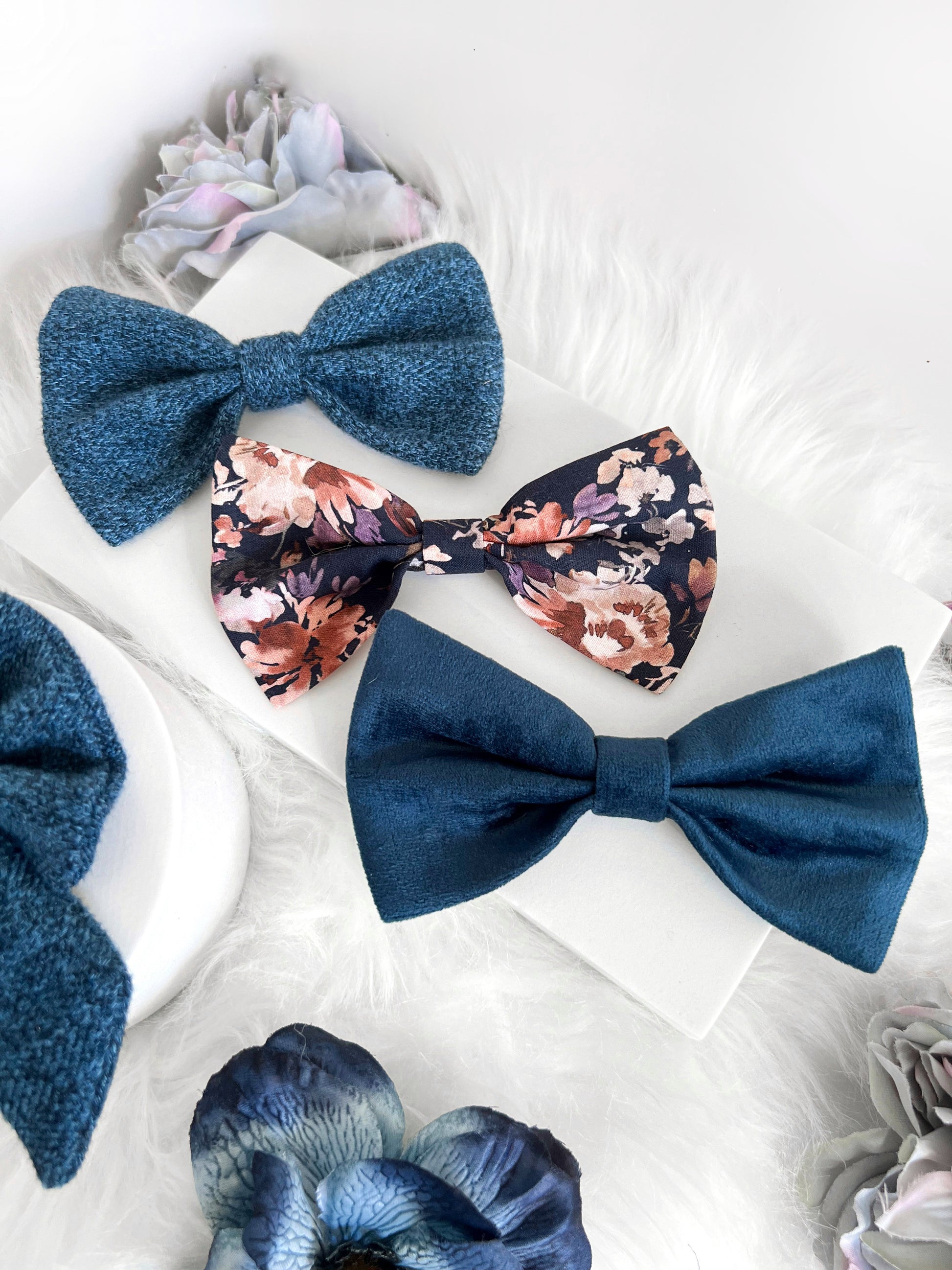 Some of the navy bows that we stock