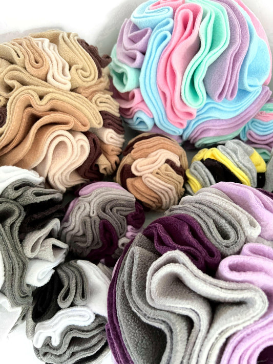 Some of the coloured snuffle balls that we have made