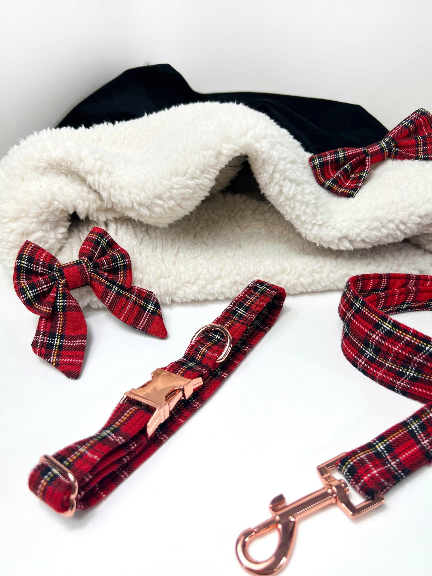 Black velvet snuggle sack & red tartan collar, lead and bow
