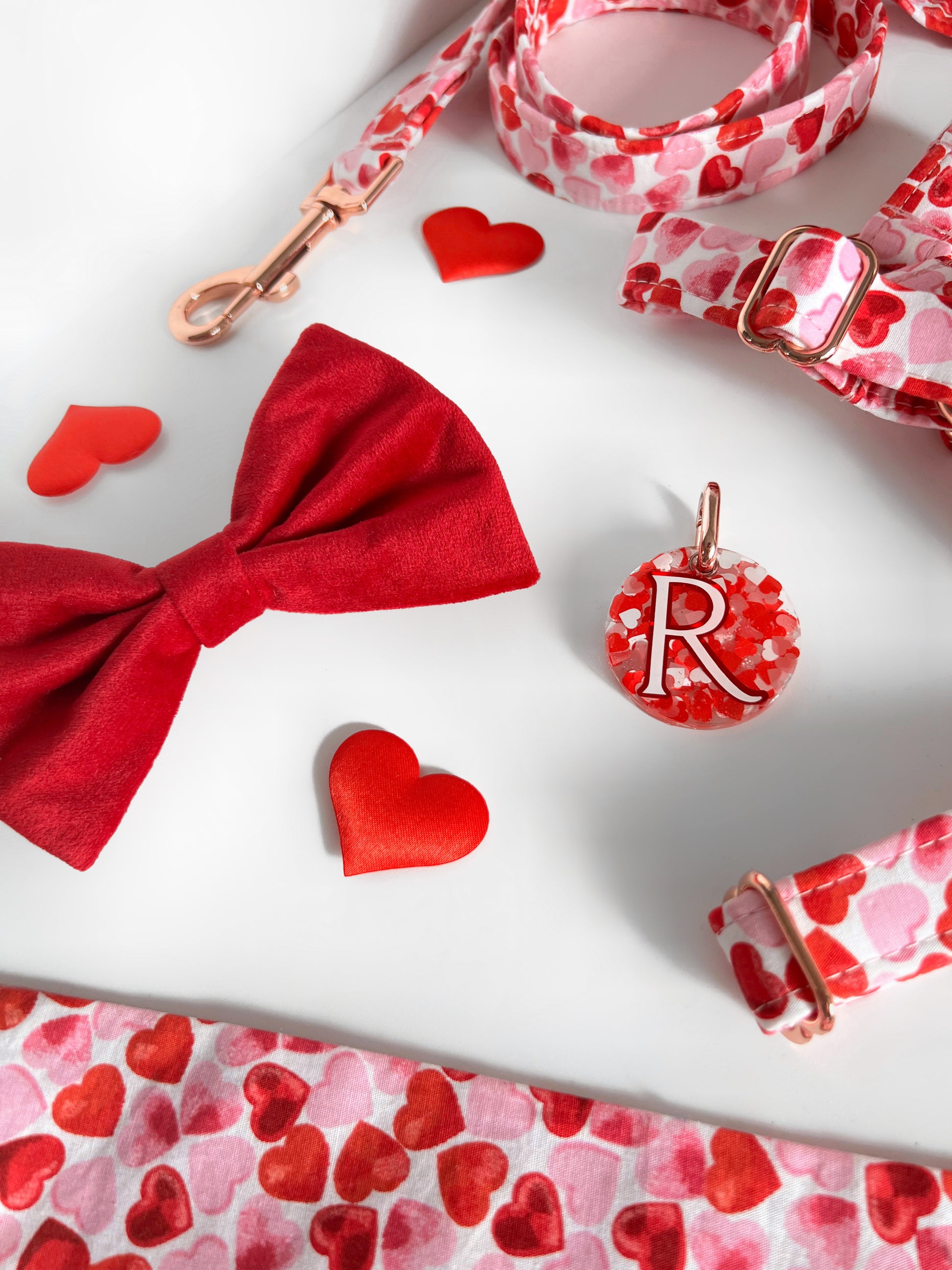 Red and pink heart dog tag with red velvet bow
