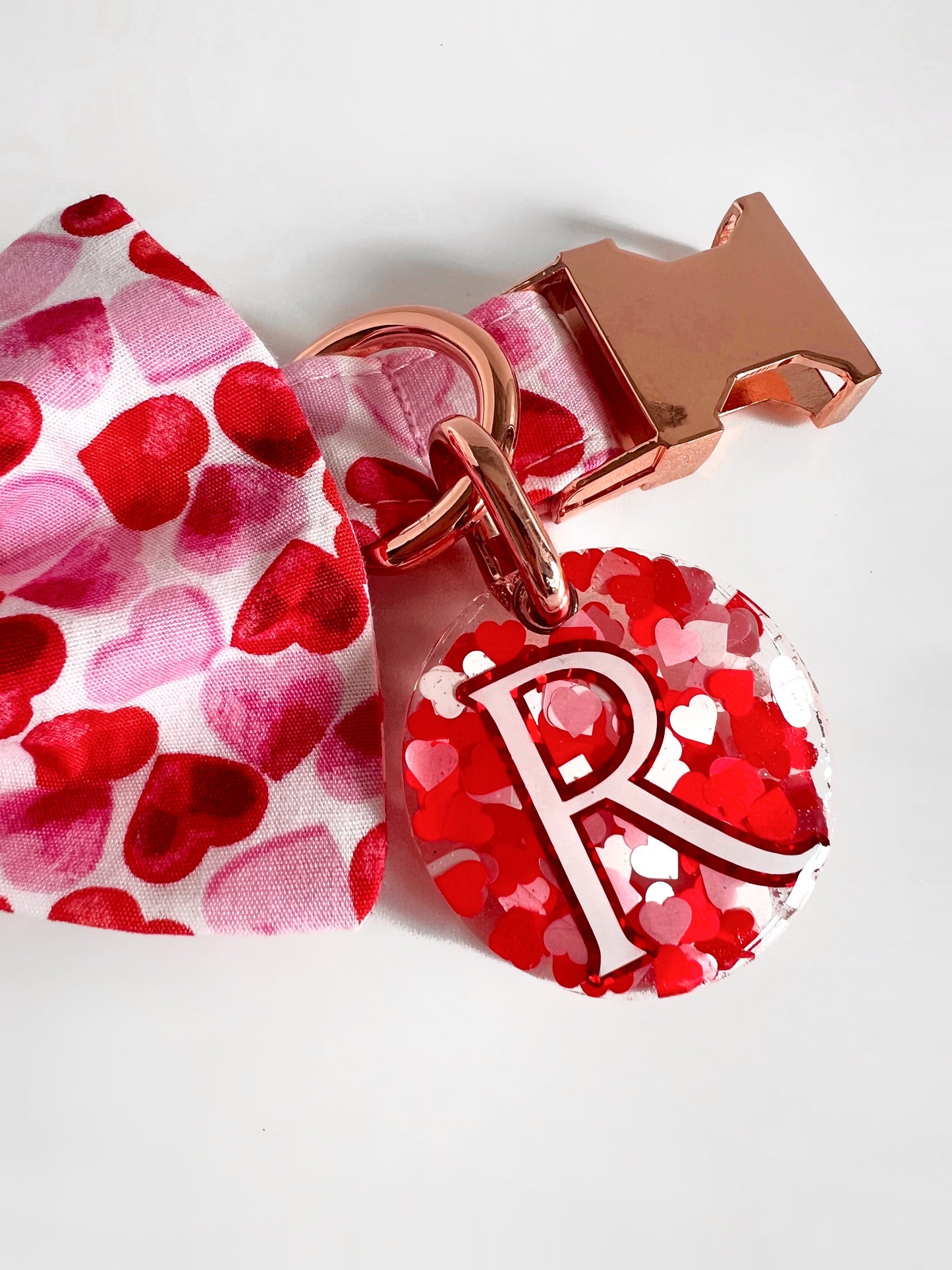Close up of puppy love dog tag