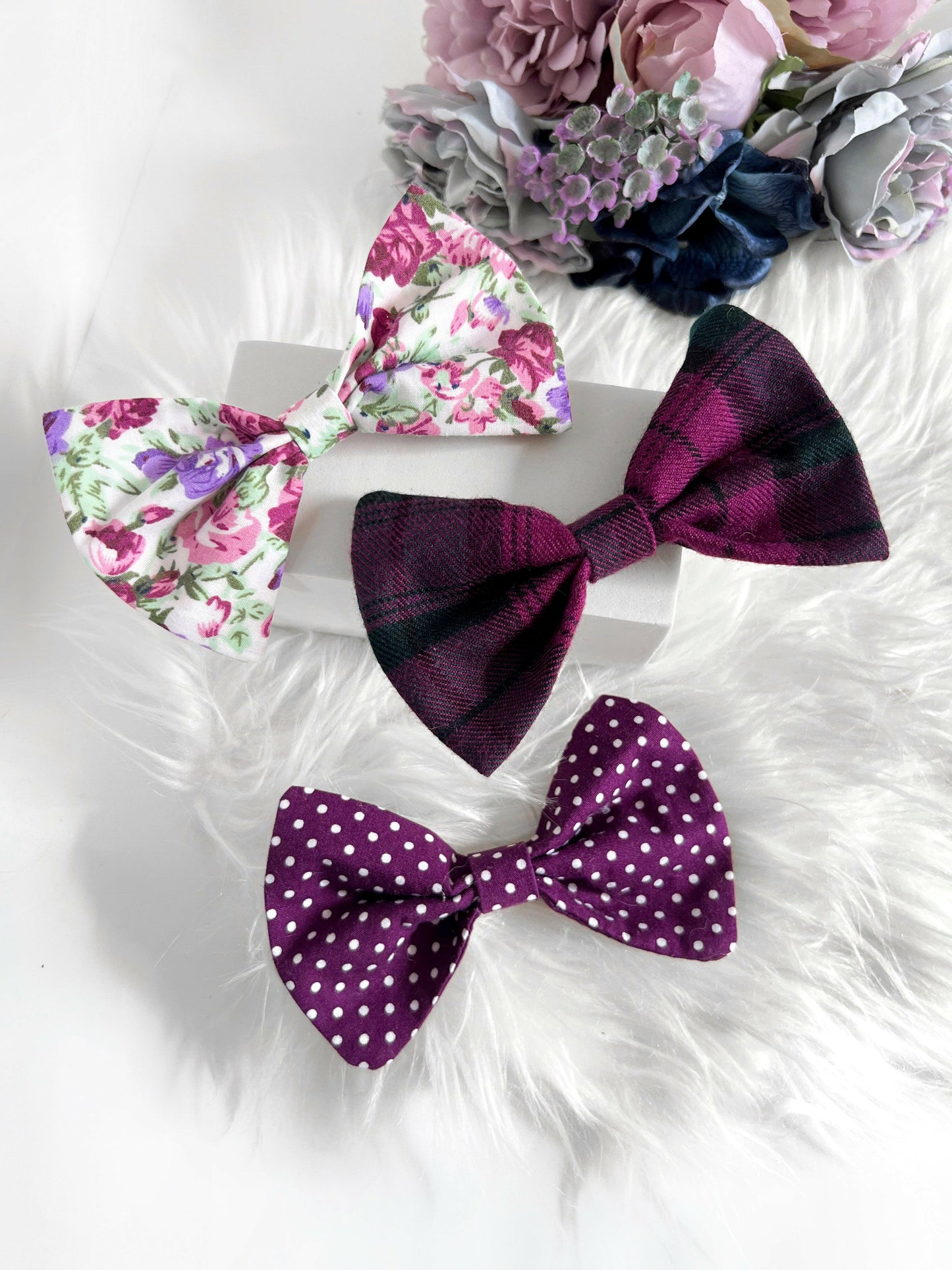 A few of the purple bows we stock