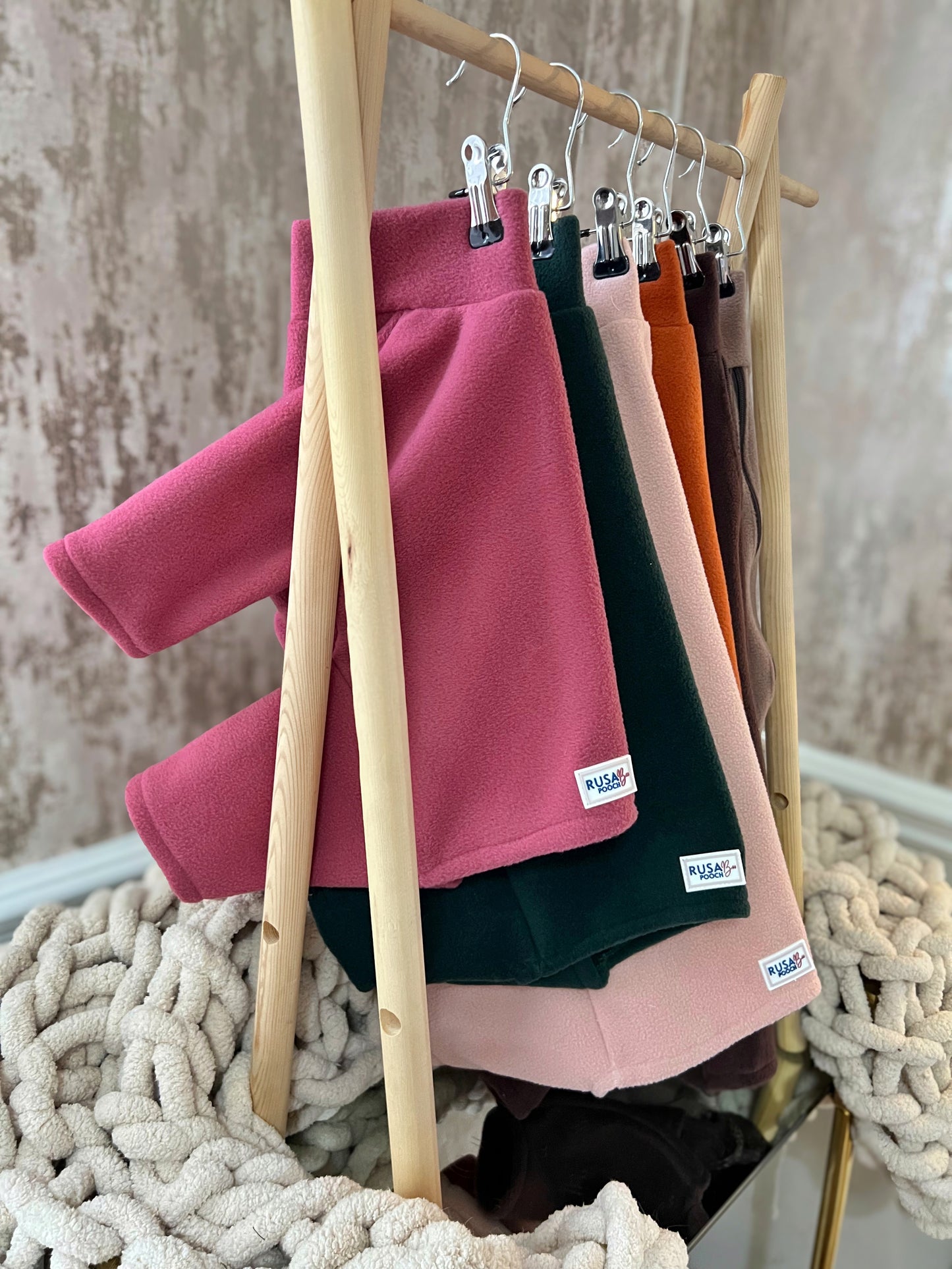 4 legged fleeces all hung up in a row