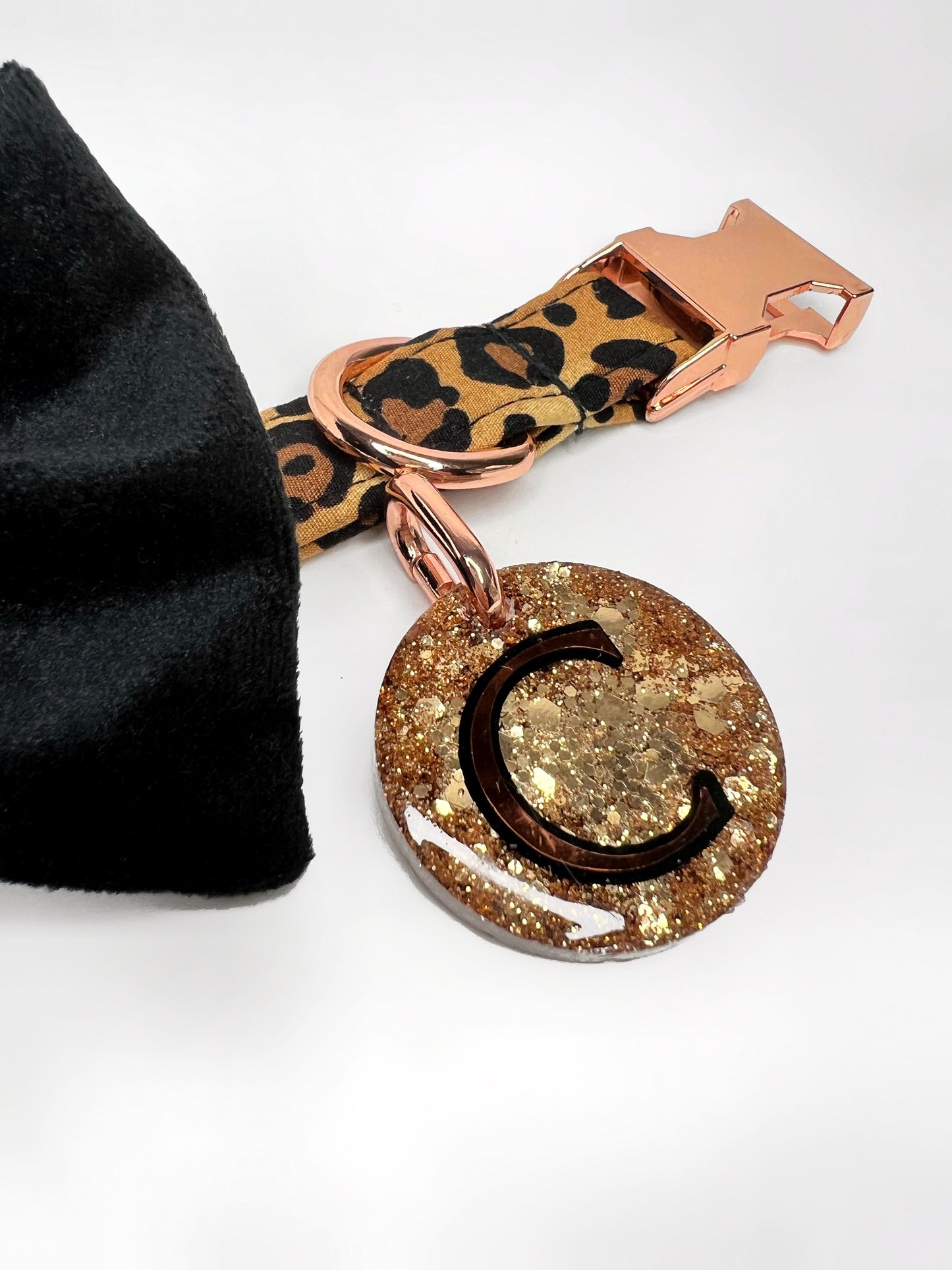 Gold glittery resin dog tag, personalised with initial