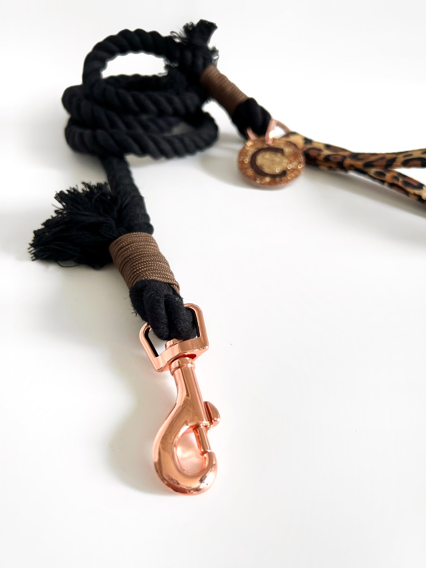 Black and brown rope lead with personalised tag