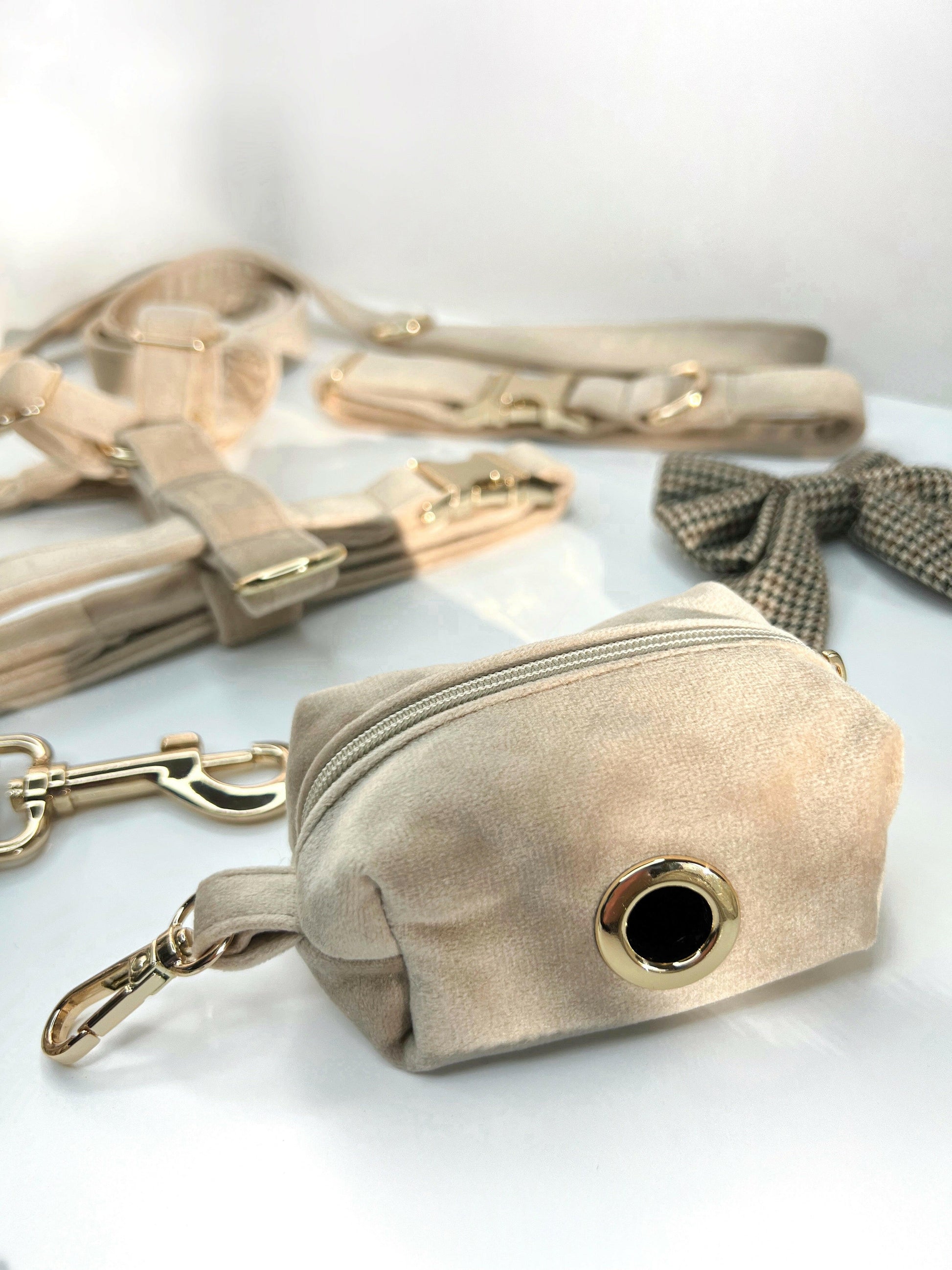 Beige velvet dog harness and poo bag - close up