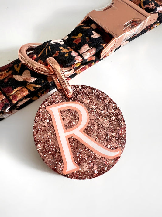 Peach glitter dog tag on a black autumn floral collar