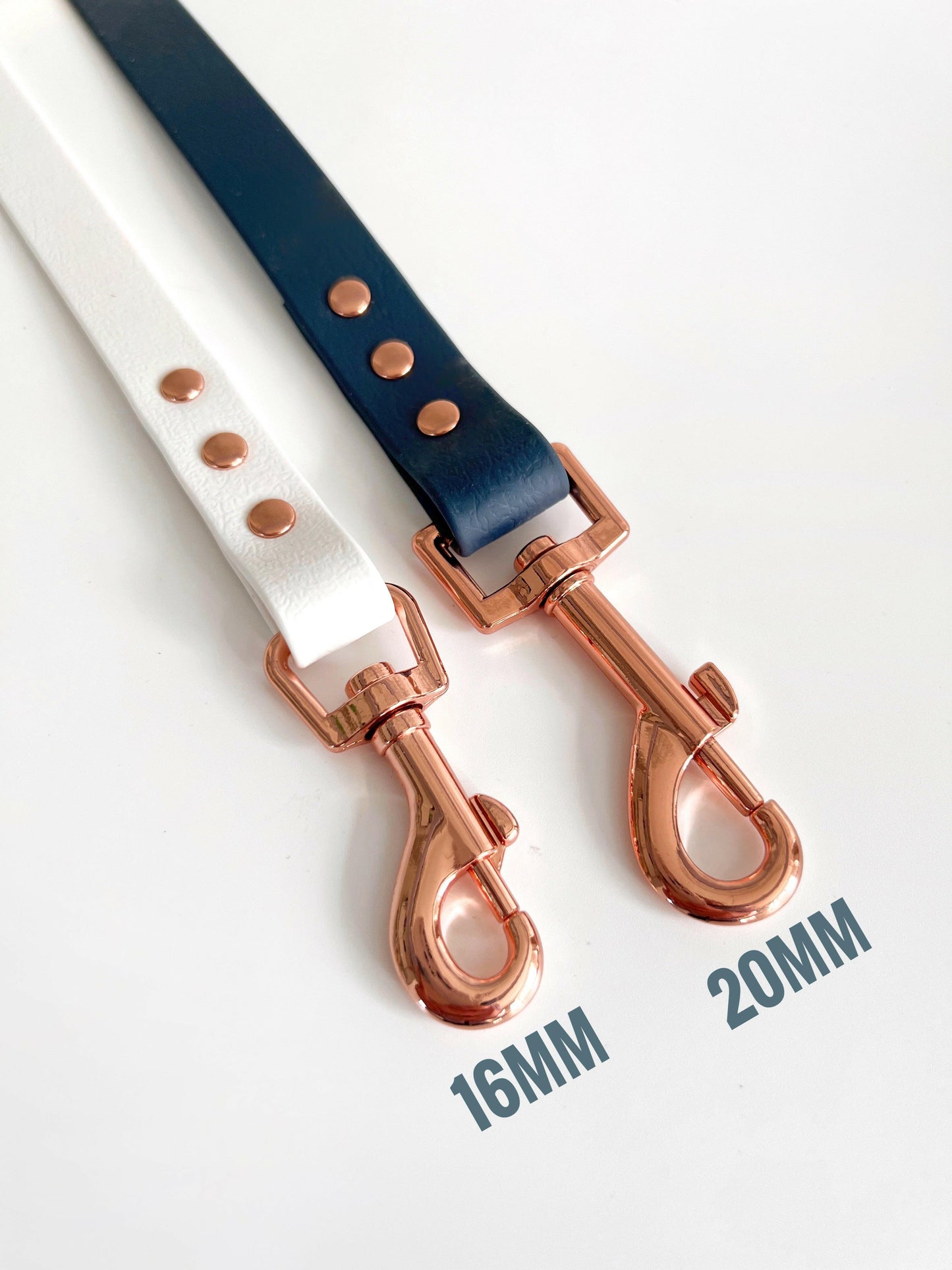 White and navy blue waterproof dog leads