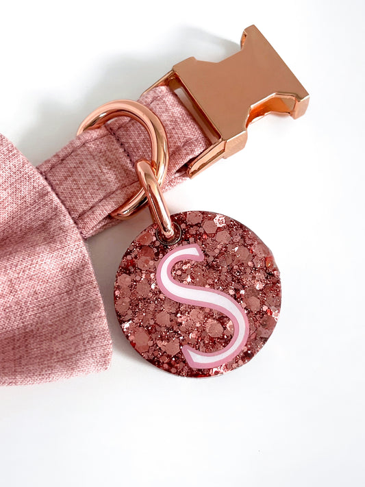 Blush pink glittery id tag on a pink linen dog collar