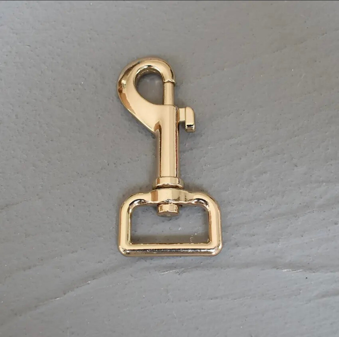 Shiny gold metal lead clip