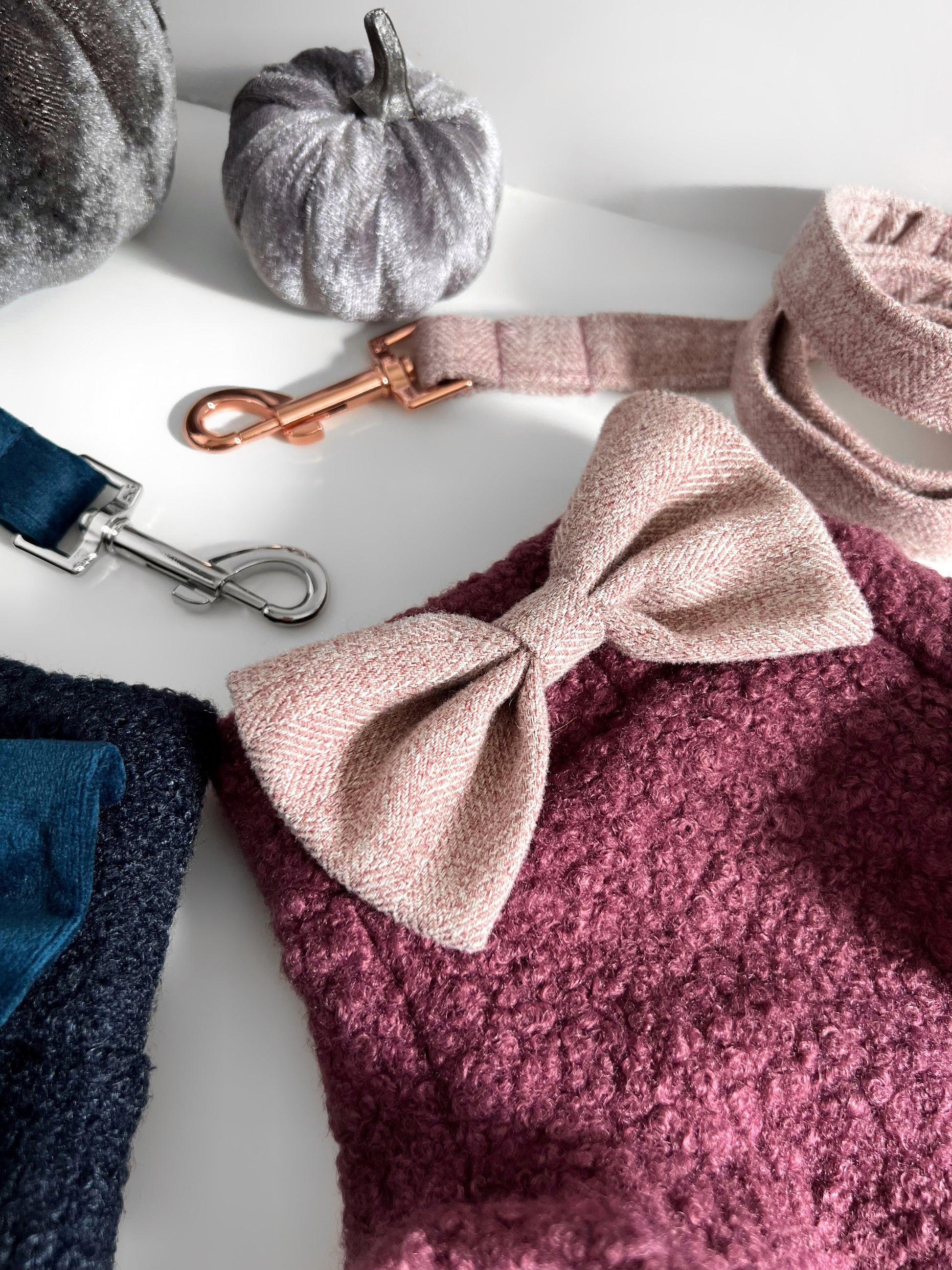 Close up of pink teddy borg jumper with pink tweed bow