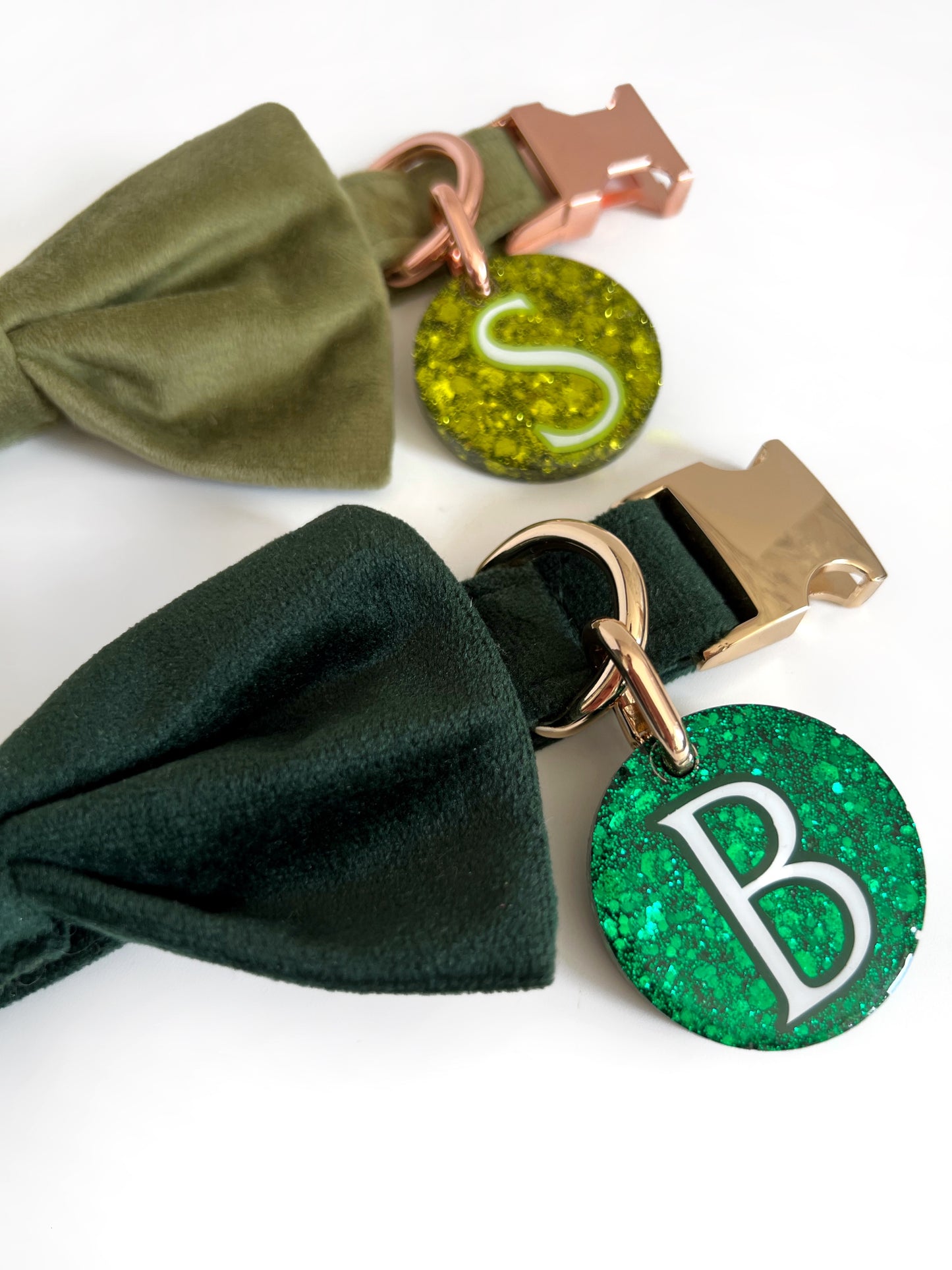 Light green and dark green id tags on matching velvet collar