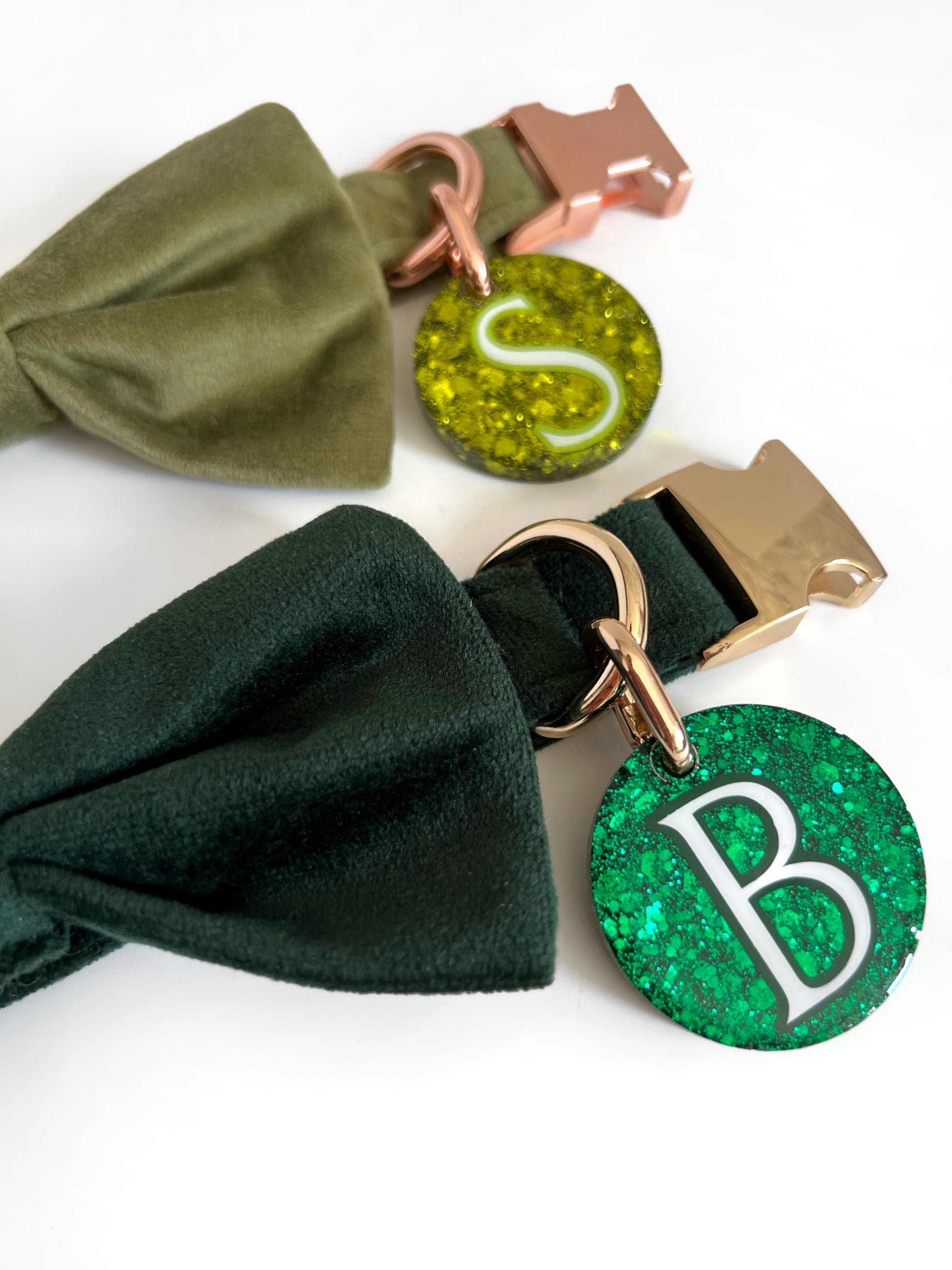 Light green and dark green id tags on matching velvet collar