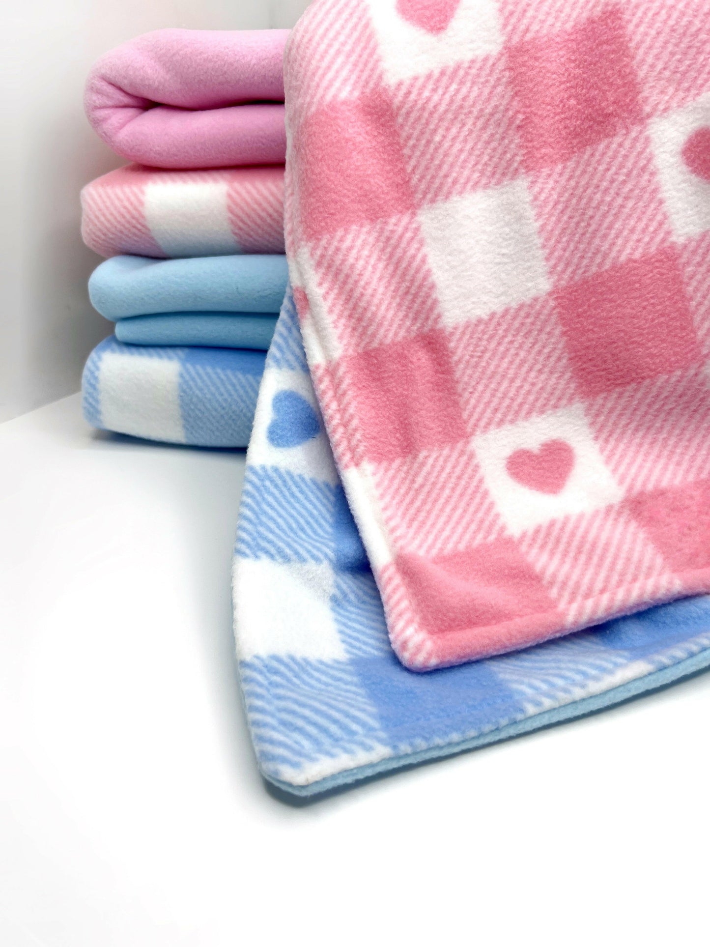Pink and blue fleece blankets