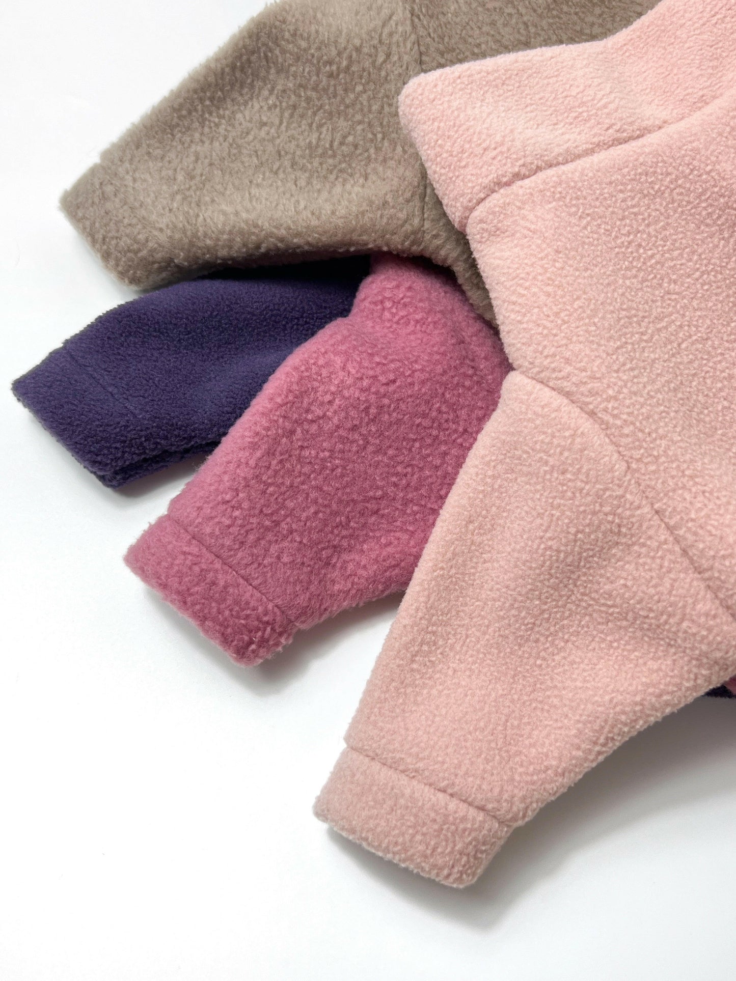Peach, mauve, purple and mocha fleeces