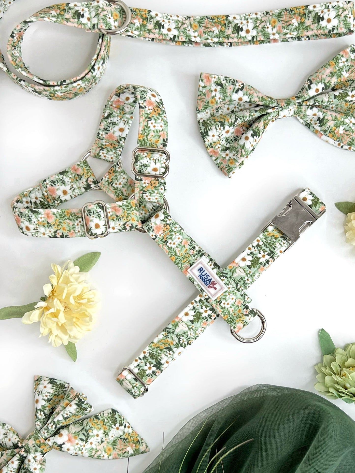 Close up of our signature strap green floral dog harness