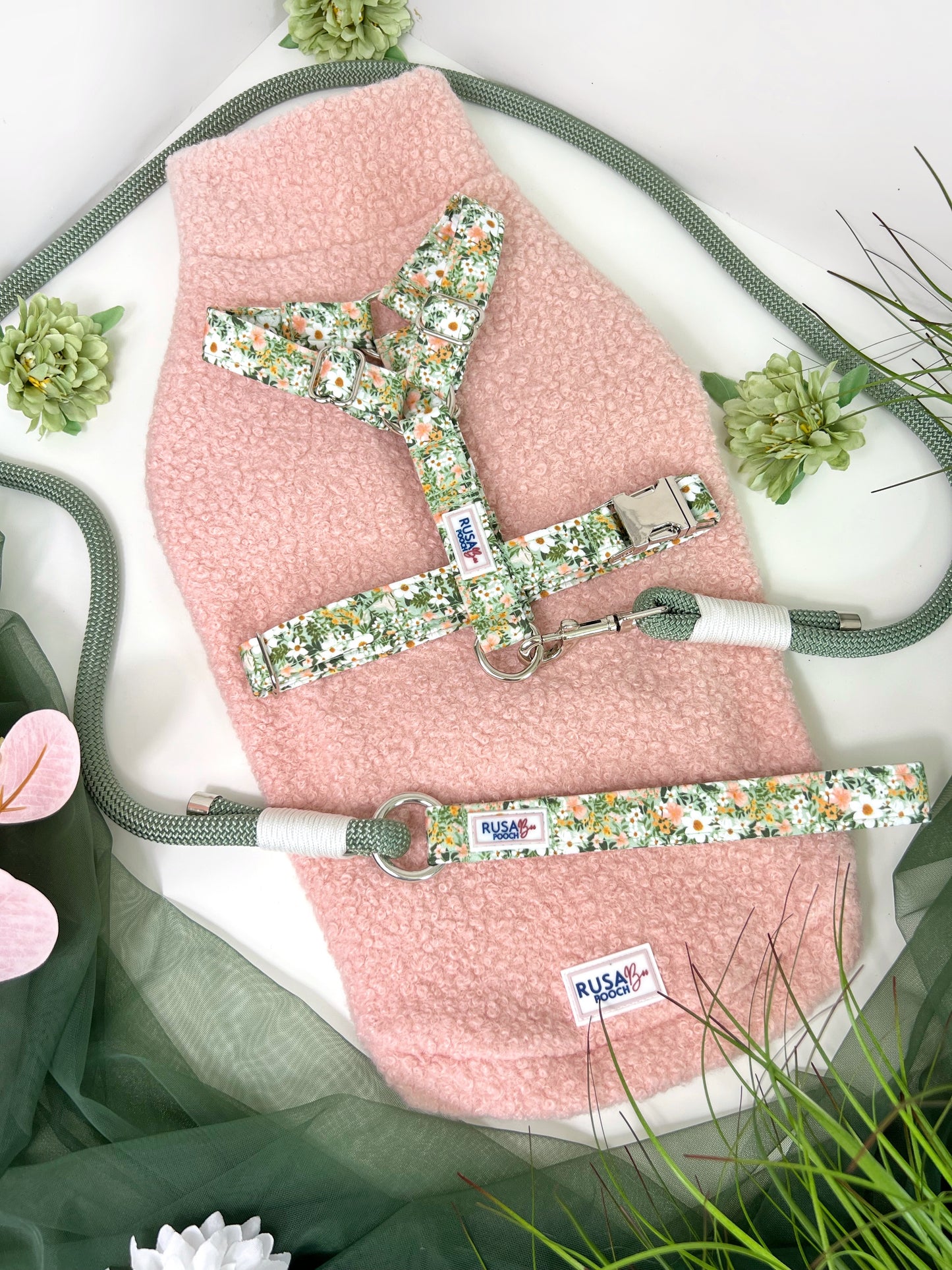 Peachy pink teddy borg takie with our green floral strap harness